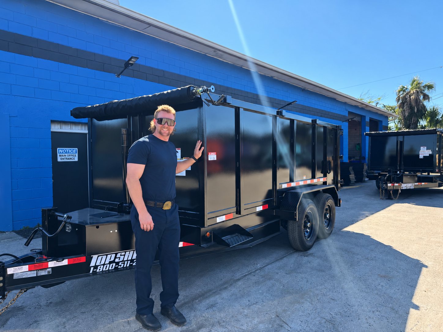 Salty City Dump Co. owner with a tall-wall dump trailer